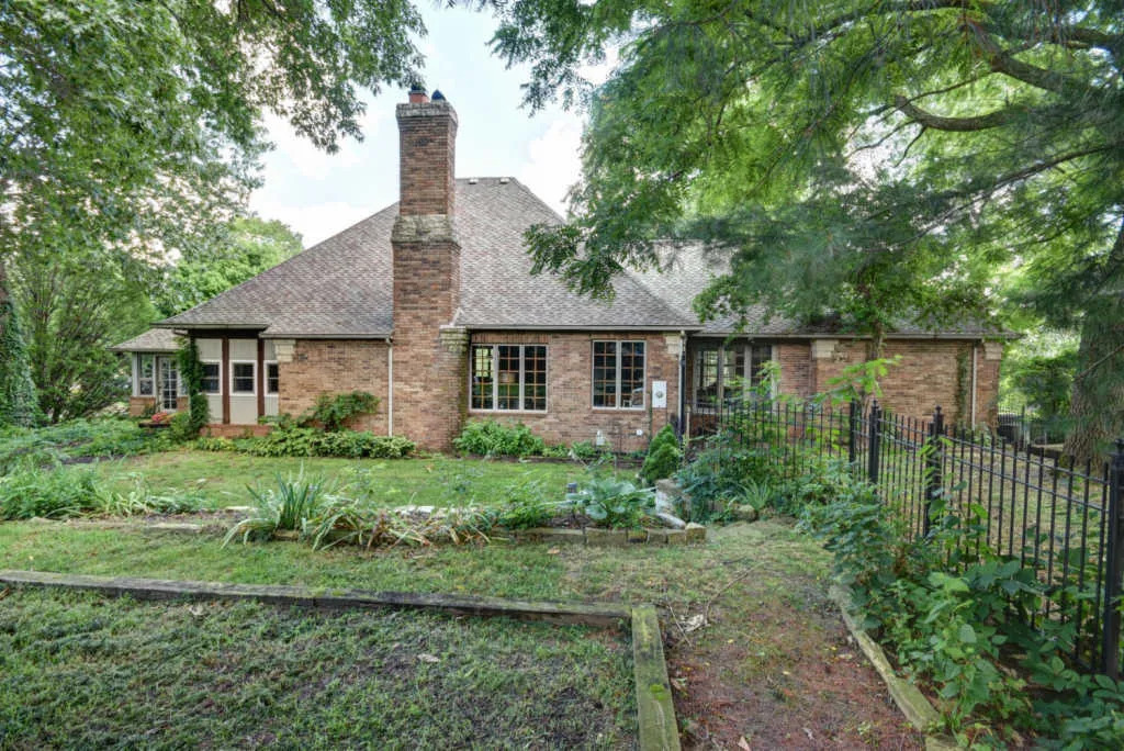 12FHE_SideOfHome.Chimney_GardenArea