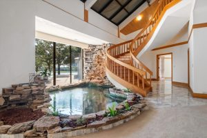 Interior Staircase of The Retreat at Rock Creek ranch for sale at auction near Norman Oklahoma