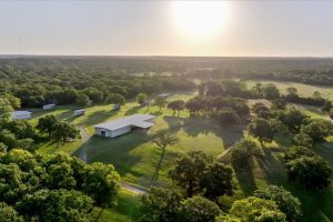 Sunset View of The Retreat at Rock Creek ranch for sale at auction near Norman Oklahoma